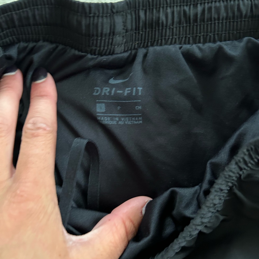 Black and purple Nike shorts